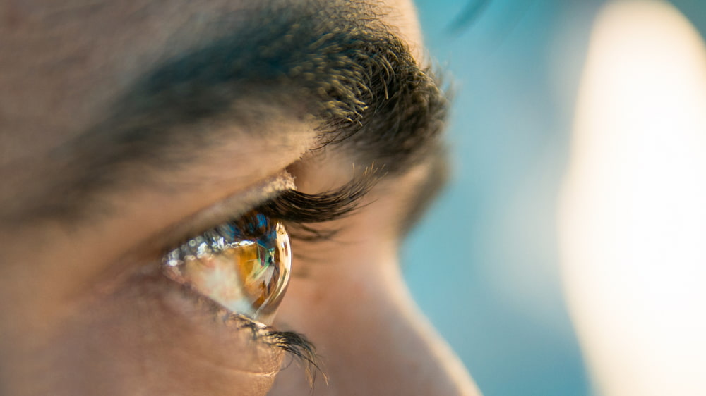 person's hazel eye close up